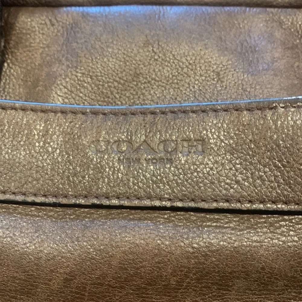 Mens brown leather Coach briefcase with adjustable shoulder straps!